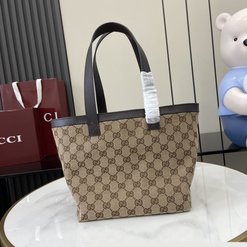 G*u*i shopping bags